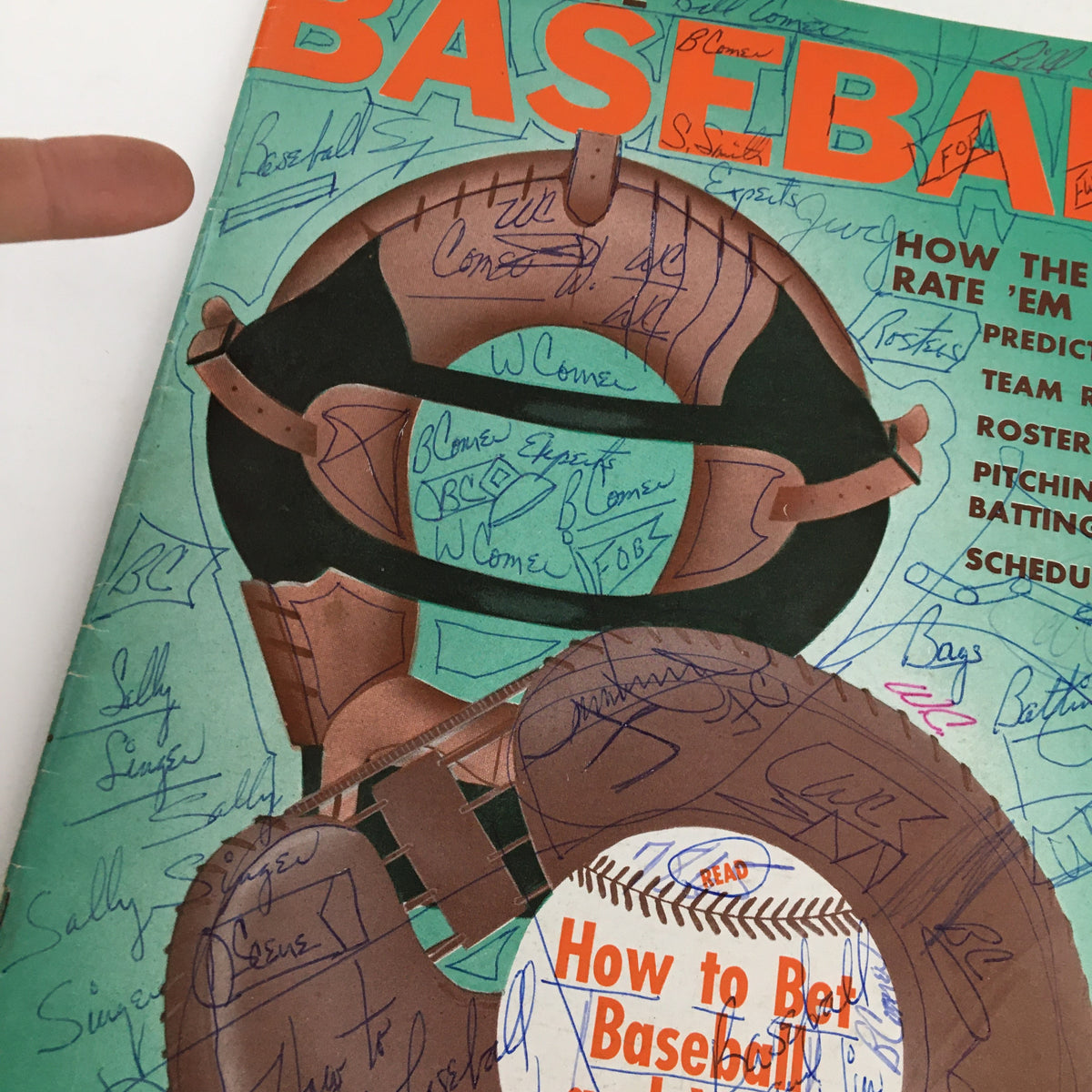 Close-up of Sportscope Magazine Baseball 1960 cover, showing details of the title 'How To Bet Baseball and Win', illustrated baseball glove and helmet, and numerous handwritten notes.