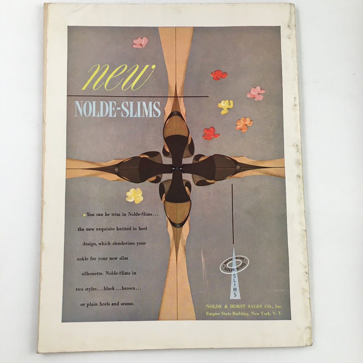 Flair Magazine October 1950 cover featuring vintage fashion advertisements, showcasing Nolde-Slims heels with a stylish mid-century design.