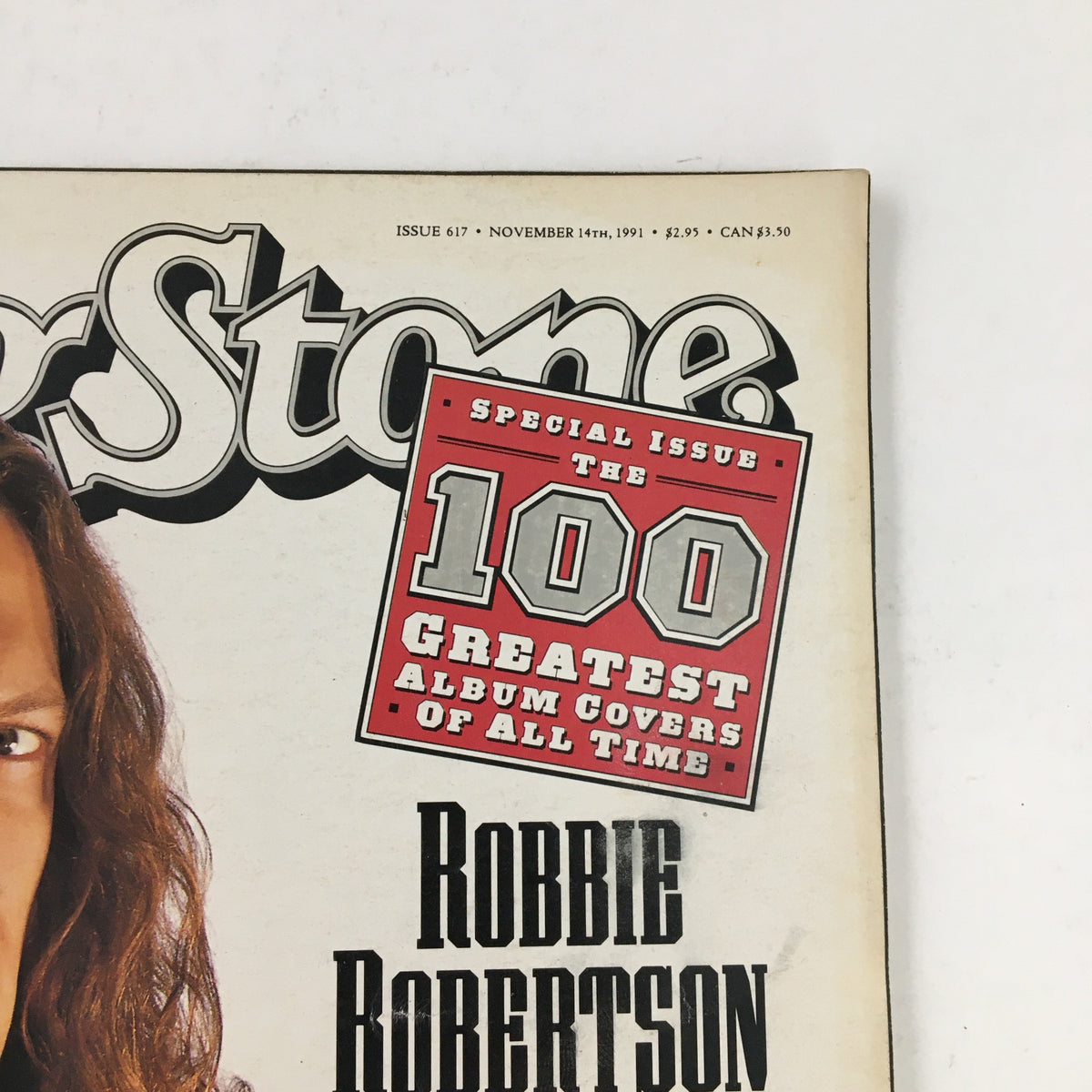 Close-up of Rolling Stone Magazine cover dated November 14, 1991, showcasing Robbie Robertson and the special issue label for the 100 Greatest Album Covers.