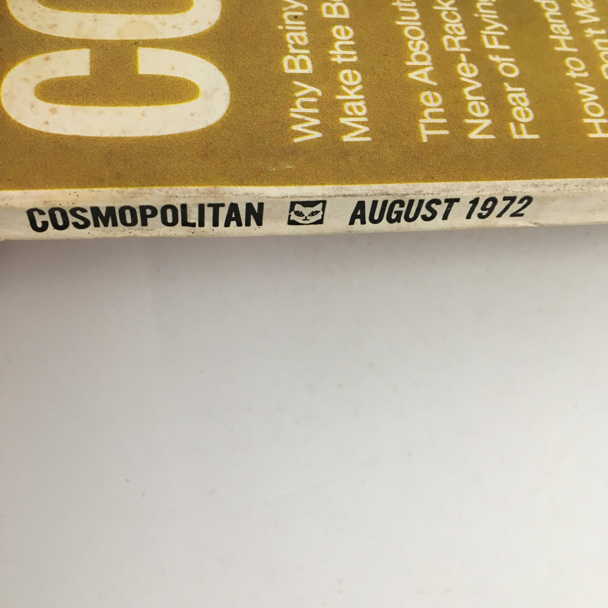 Spine of Cosmopolitan Magazine August 1972, displaying the magazine title and date, highlighting the issue's vintage appeal for collectors.