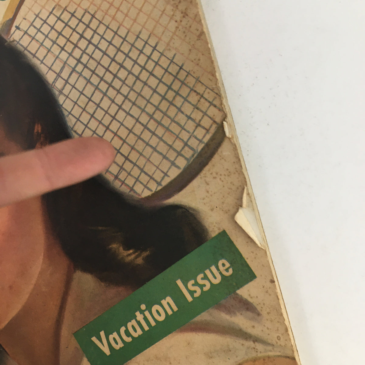 Detail of Cosmopolitan Magazine September 1941 showing 'Vacation Issue' label, emphasizing its theme and vintage appeal.