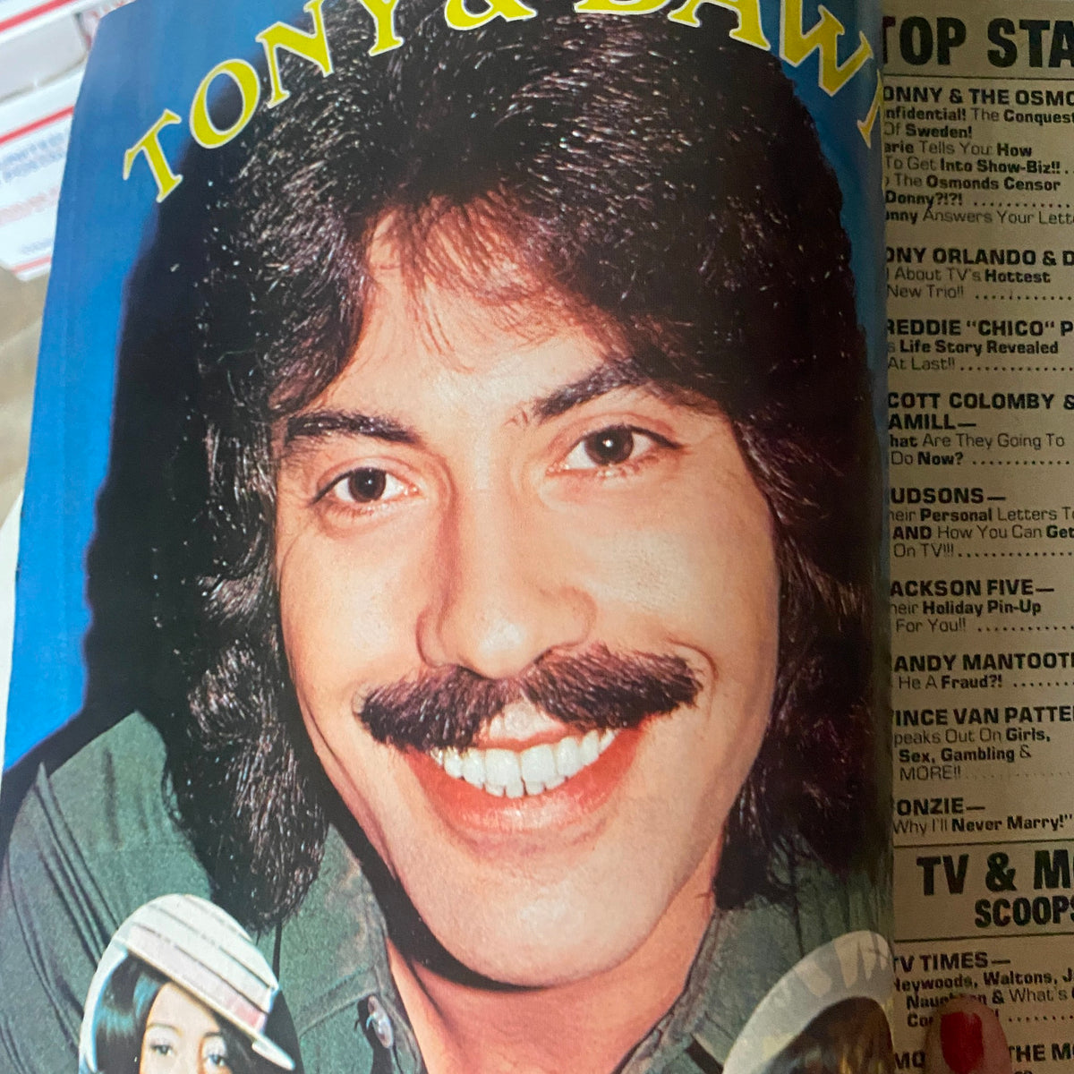 Image from VTG 16 Magazine February 1975 showcasing Tony Orlando, smiling and engaging the audience, reflecting the essence of 1970s music culture.