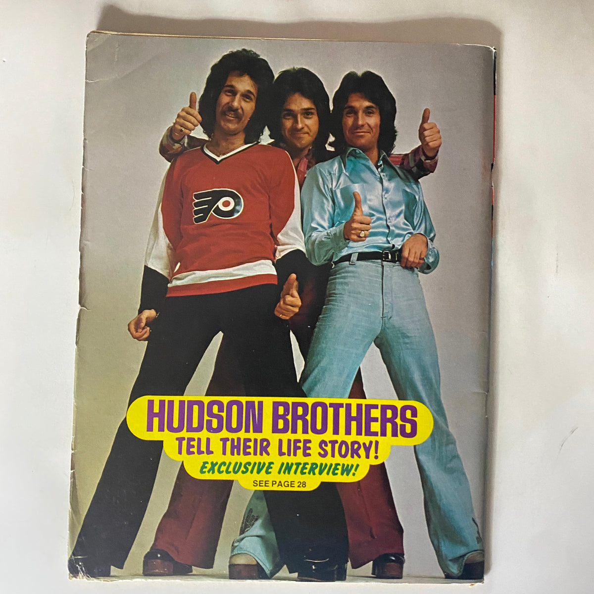 Cover image of Vintage 16 Magazine September 1975 displaying the Hudson Brothers with thumbs up and the headline 'Hudson Brothers Tell Their Life Story! Exclusive Interview!'