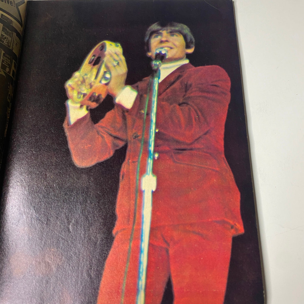 Full-color image of Davy Jones performing with a tambourine in Teen Screen Magazine March 1968.