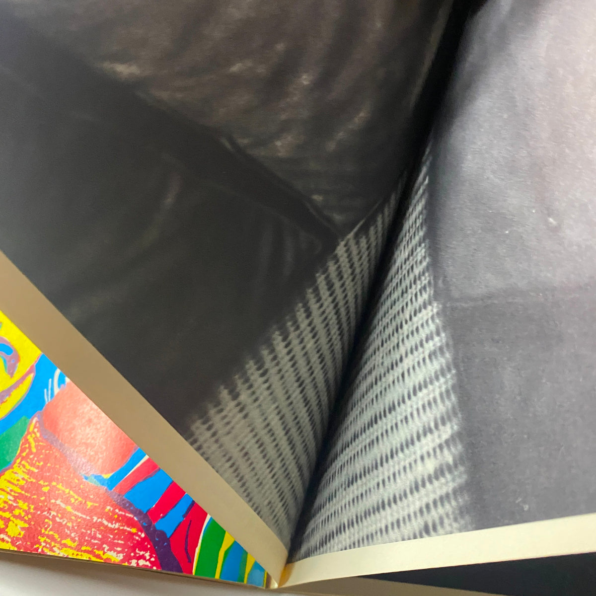 An interior page of Teen Set Magazine April 1968 featuring a colorful abstract design contrasting with a patterned black and white background.