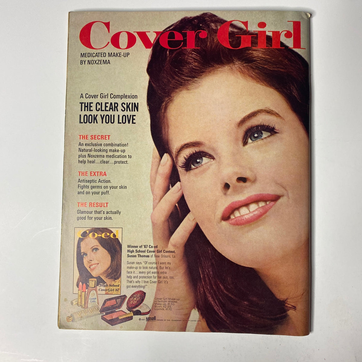 Cover Girl magazine featuring medicated make-up by Noxzema. The cover promotes clear skin with a striking image of a woman with radiant skin and bright smile, titled 'Cover Girl'.