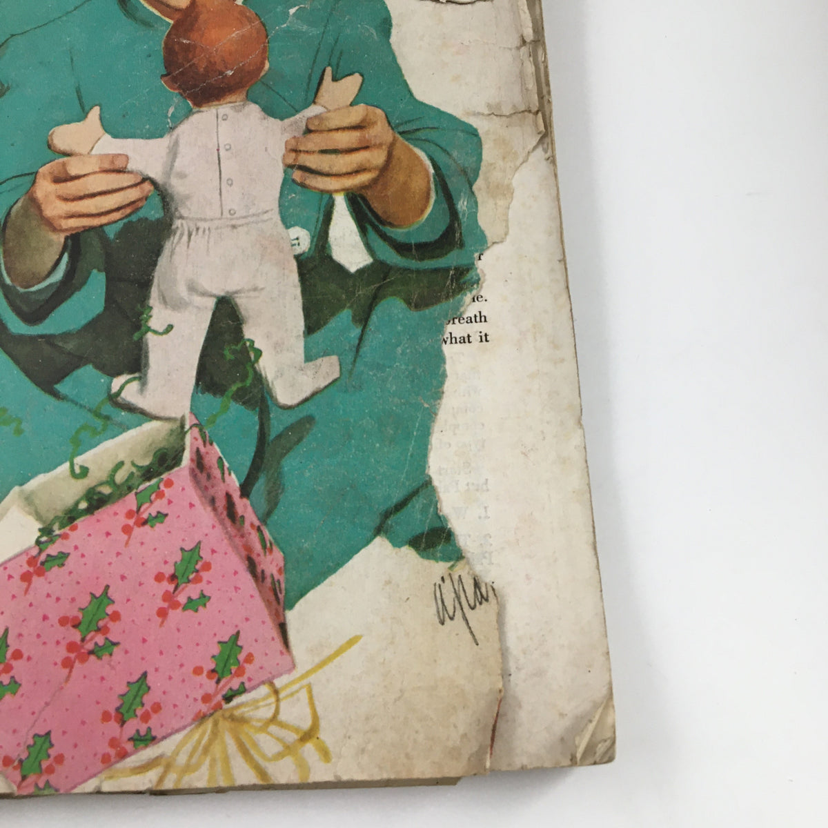 Image of a child in a white outfit being held by a smiling woman on the cover of Ladies' Home Journal Magazine December 1948, with holiday-themed elements visible.