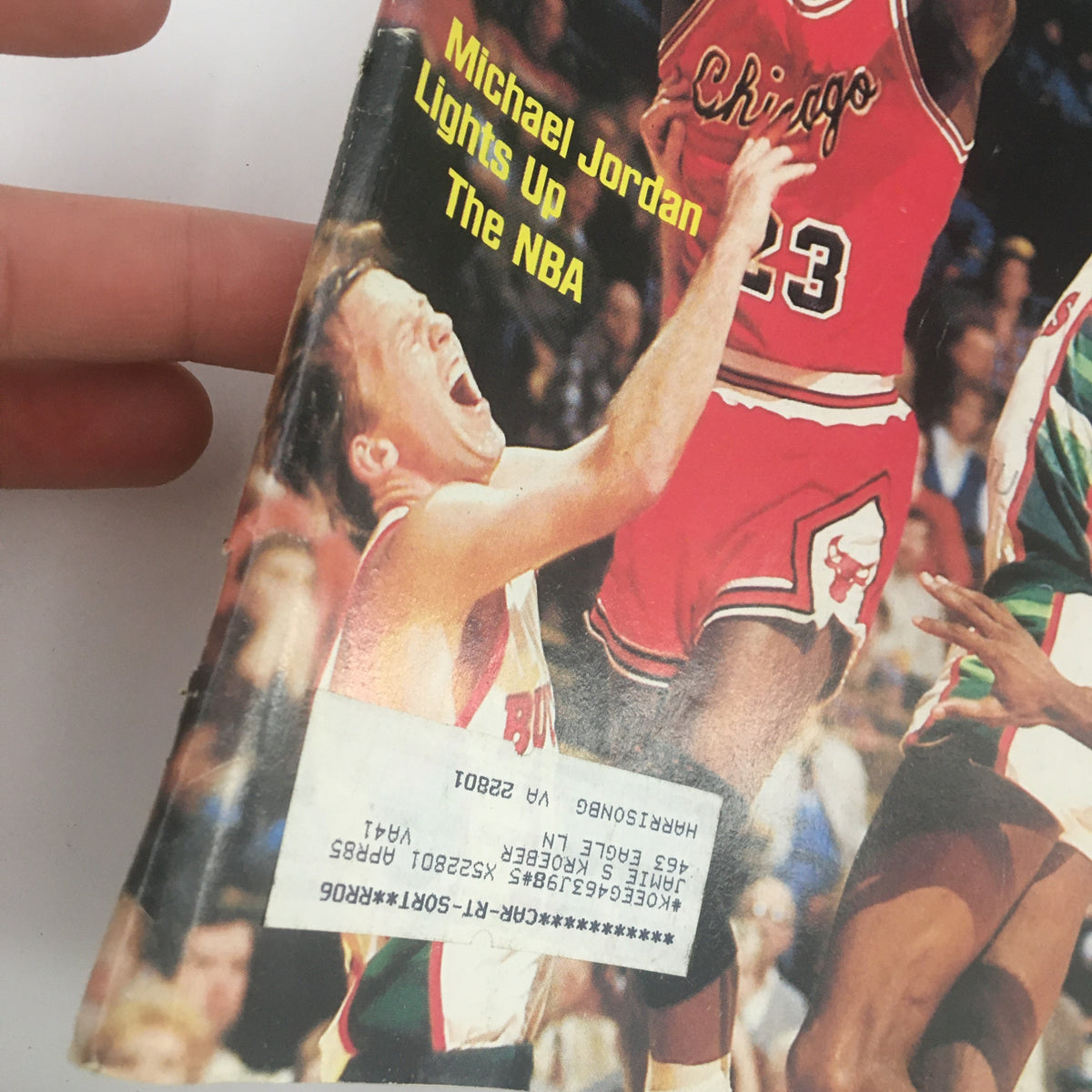Cover of Sports Illustrated Magazine from December 10, 1984, featuring NBA star Michael Jordan of the Chicago Bulls. The magazine highlights Jordan's impact on the NBA with the text 'Michael Jordan Lights Up The NBA.'
