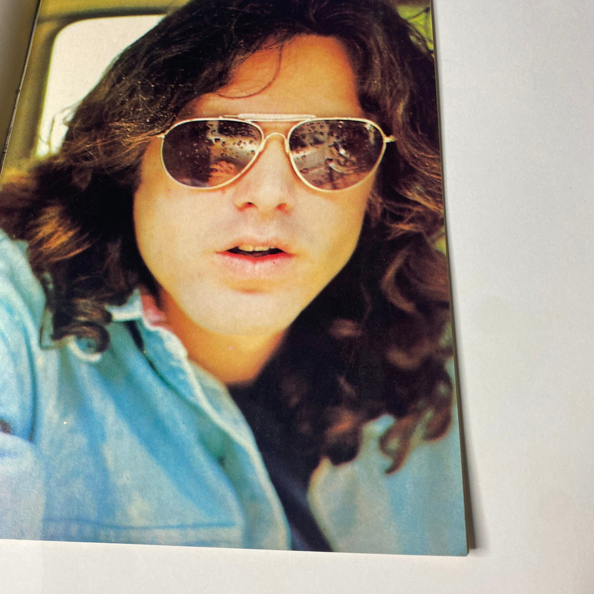 Image of Jim Morrison wearing sunglasses in Hullabaloo Magazine November 1968 Vol 4 No. 2 featuring a full-color poster. Vintage collectible magazine from the psychedelic rock era.