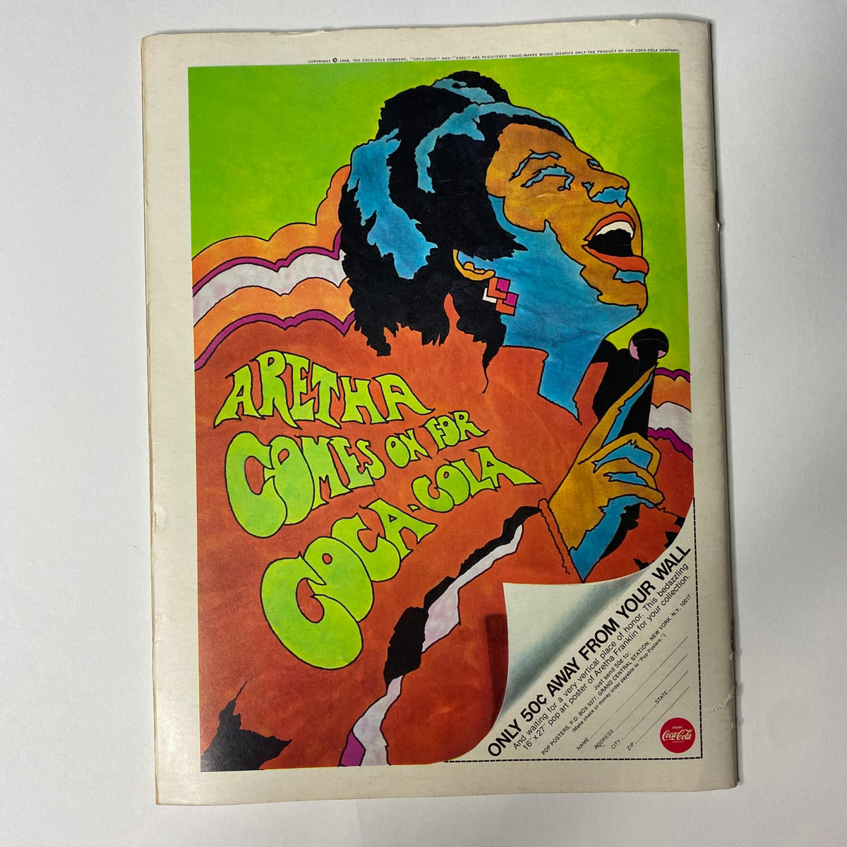 Colorful advertisement for Aretha Franklin, promoting Coca-Cola, featured in Hullabaloo Magazine November 1968 Vol 4 No. 2, capturing the vibrant art style of the era.