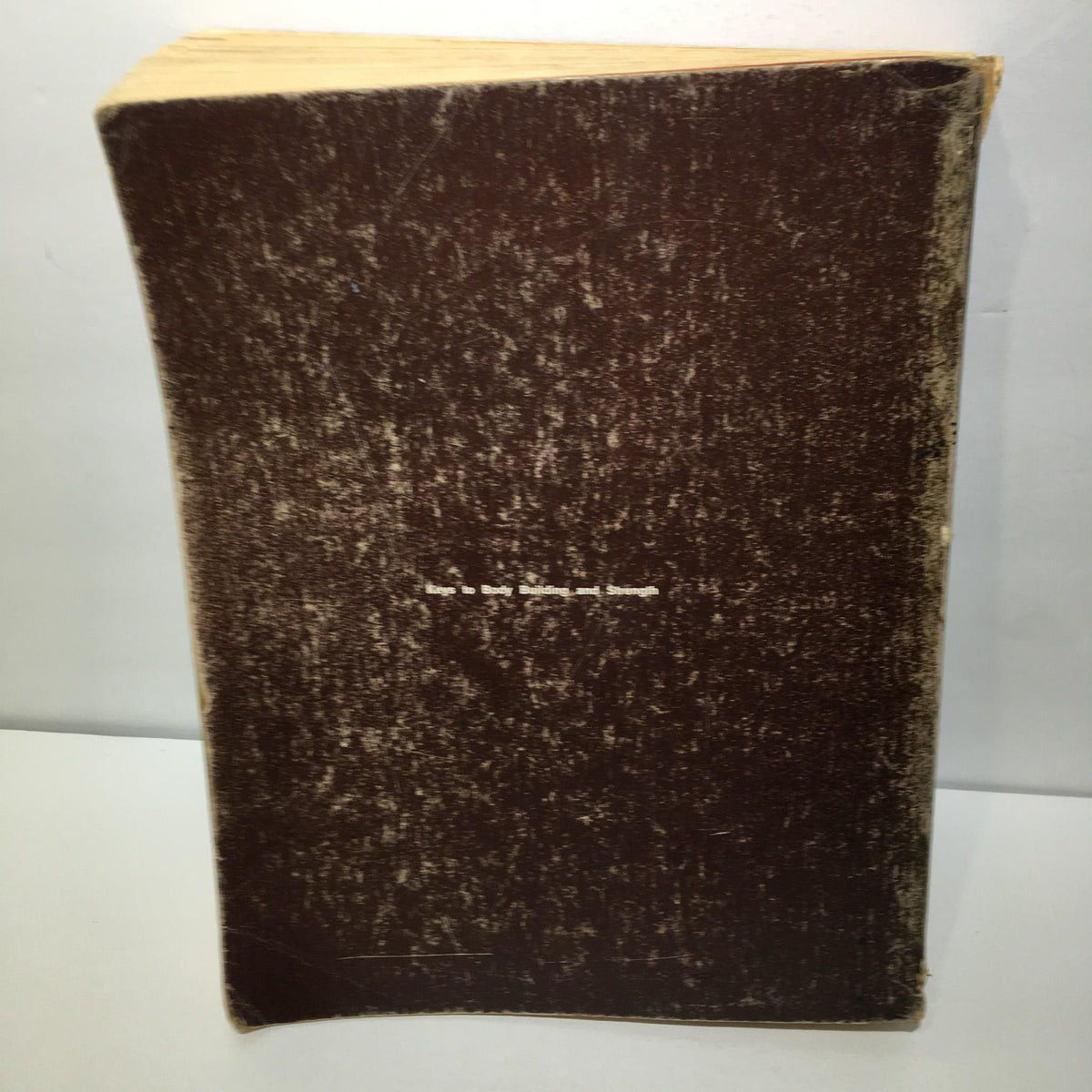 Back cover of 'Keys to the Inner Universe Vol. 1' 1980 by Bill Pearl, displaying a vintage texture with title details.