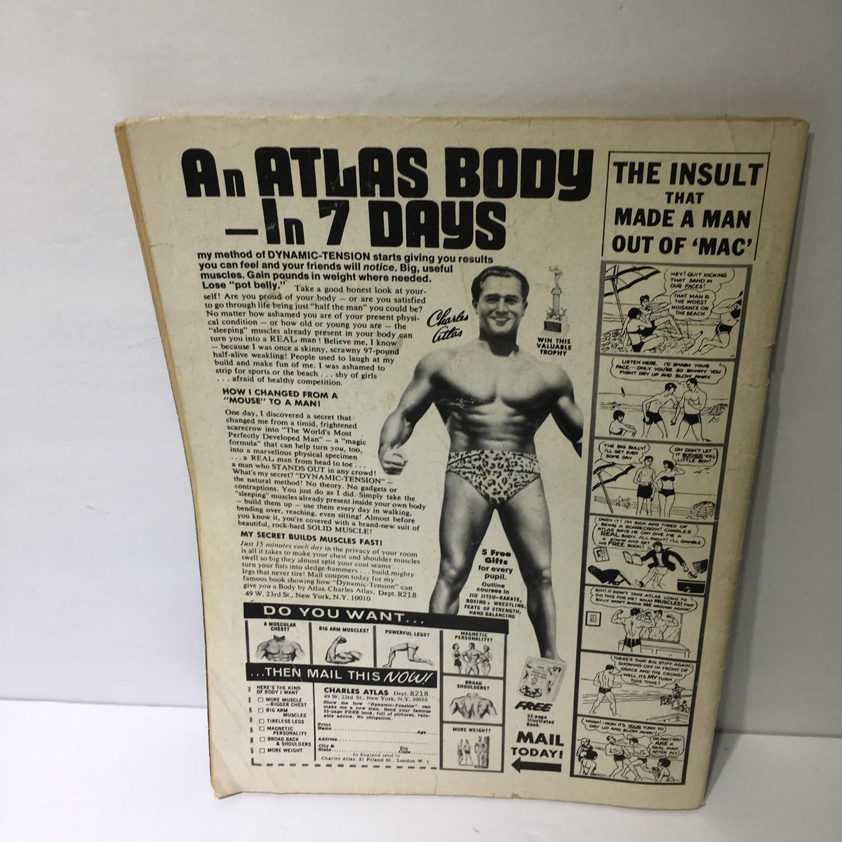Back cover of Wrestling 1976 Annual #2 showcasing fitness advertisement with Charles Atlas promoting muscle gain techniques.