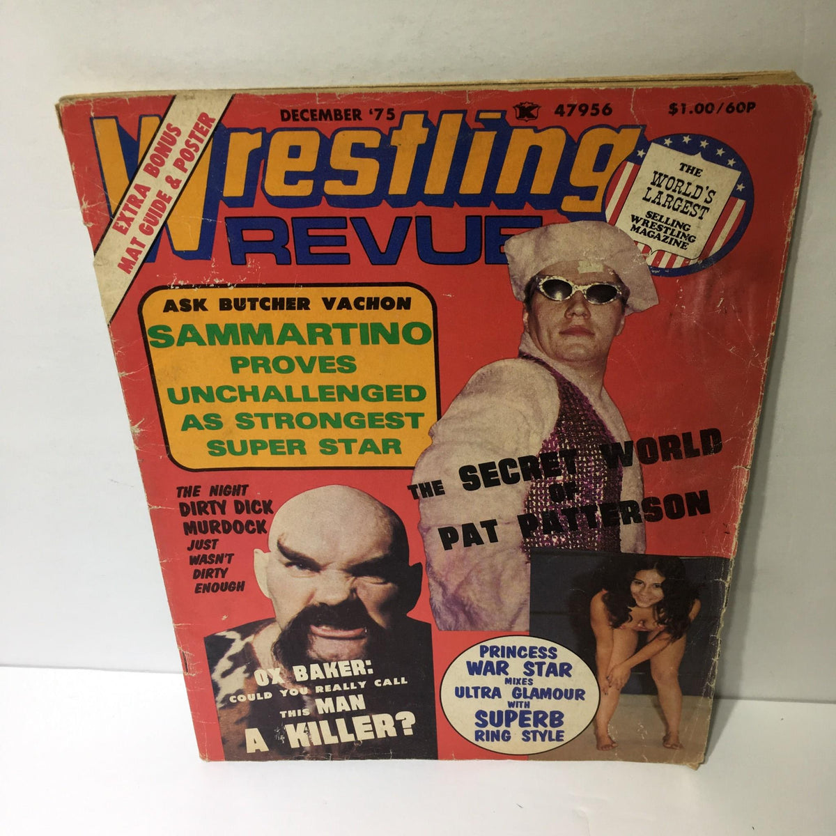 Wrestling Revue Magazine December 1975 featuring Bruno Sammartino and Ox Baker on the cover, highlighting wrestling news with vibrant graphics and headlines.