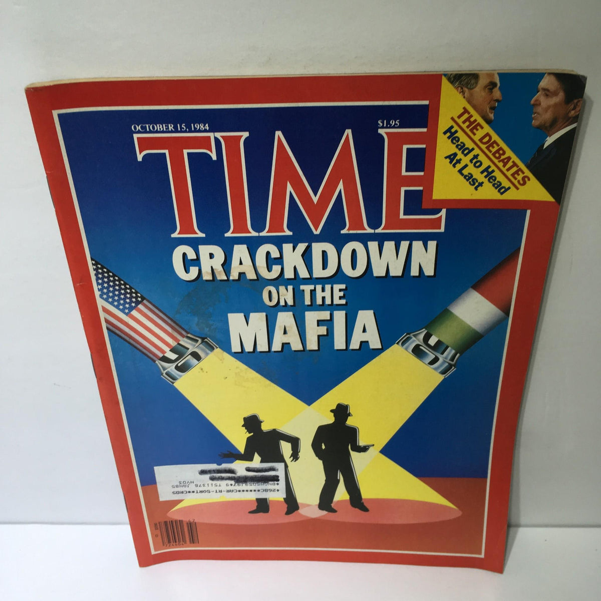 Cover of Time Magazine dated October 15, 1984, featuring the headline 'Crackdown on the Mafia' with a colorful design showcasing police spotlights.
