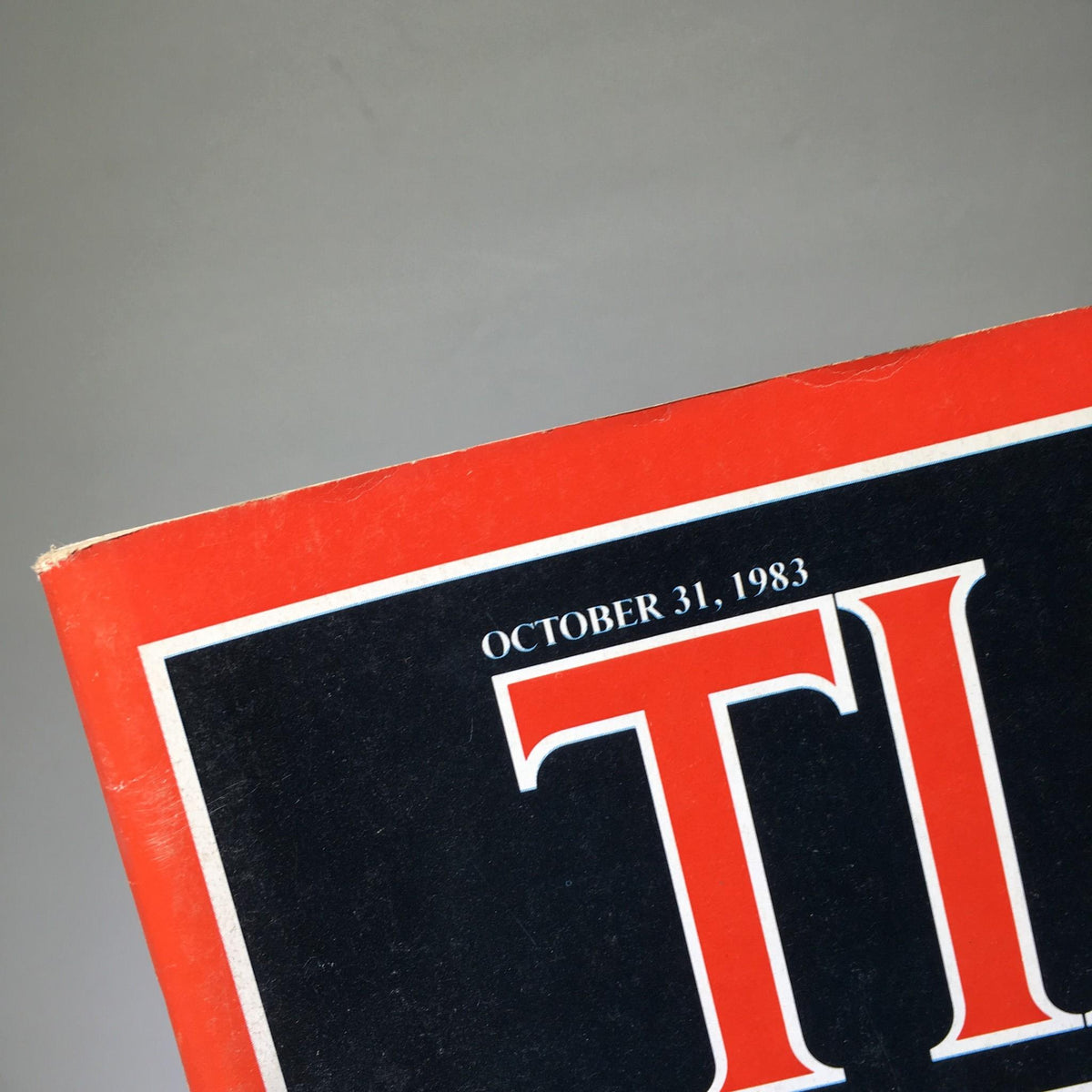 Close-up of the date on the Time Magazine cover, showing 'October 31, 1983' alongside the iconic magazine title.