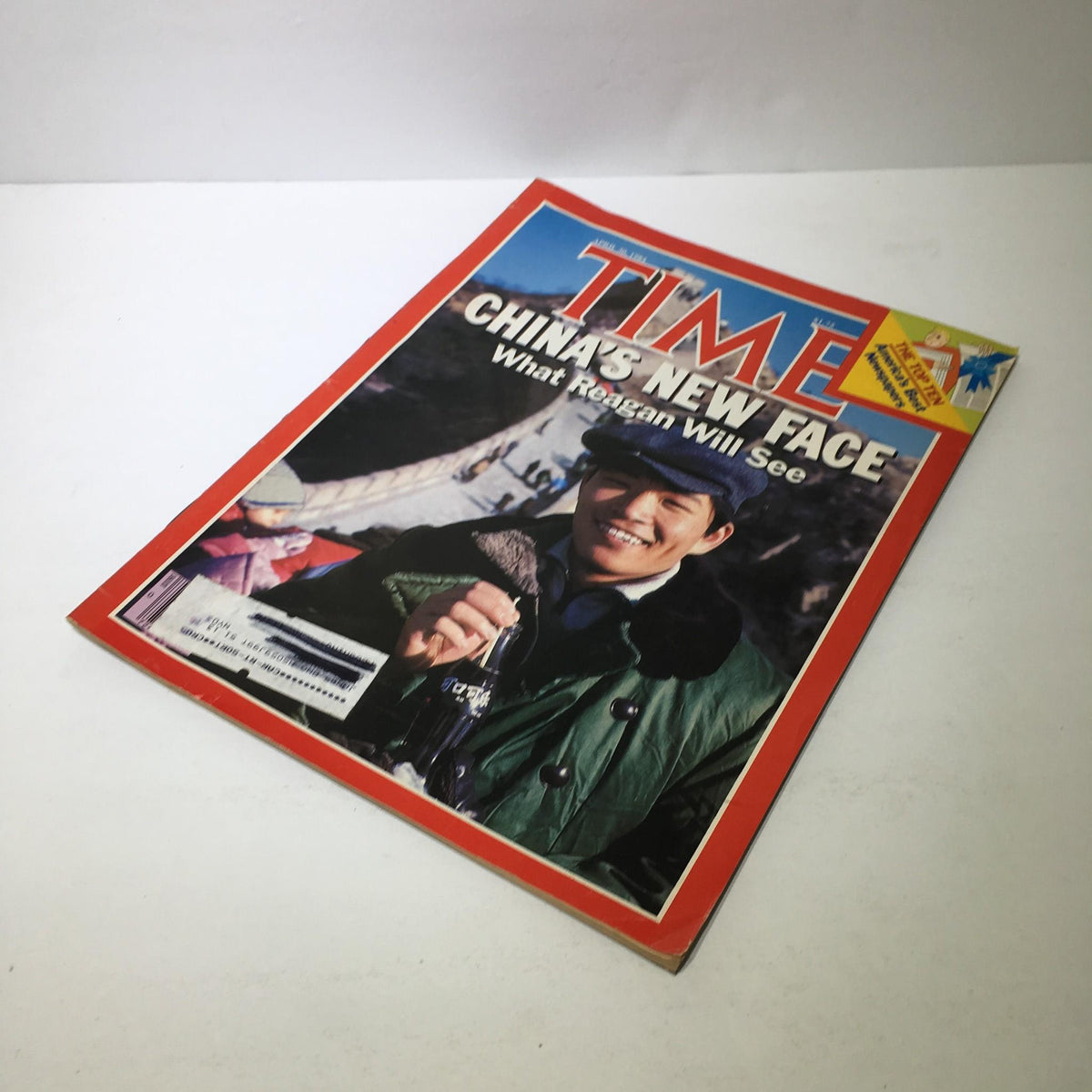 Another angle of the Time Magazine cover dated April 30, 1984, with the title 'China's New Face: What Reagan Will See' visible along with a photograph of a smiling young man.