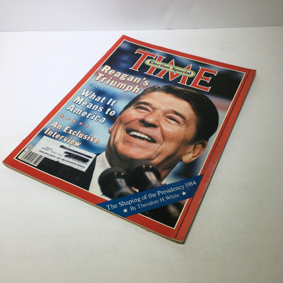 Time Magazine cover from November 19, 1984, titled 'Reagan's Triumph: What It Means to America', featuring Ronald Reagan smiling at a podium.