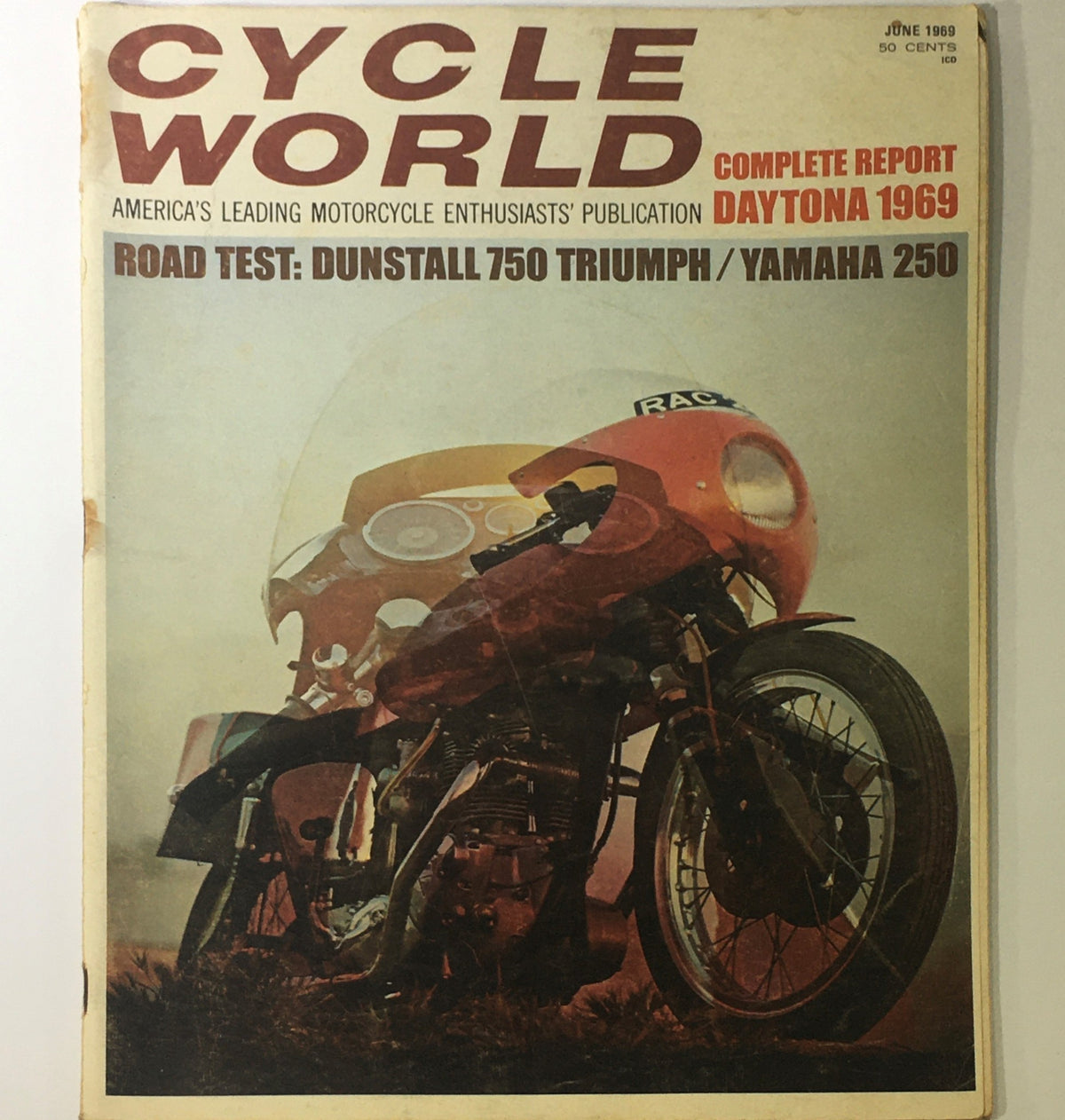 Cover of Cycle World Magazine from June 1969 featuring the title, 'VTG Cycle World Magazine June 1969 - Dunstall 750 Triumph & Yamaha 250 Road Test', showcasing a striking motorcycle image with details of a road test for the Dunstall 750 Triumph and Yamaha 250.