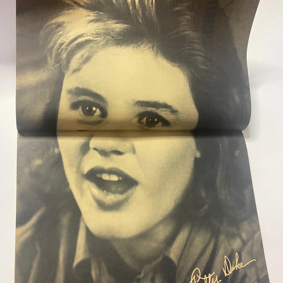Patty Duke featured in 16 Magazine October 1964 Vol 6 No. 5, capturing her youthful expression in a vintage photograph, enhancing the nostalgic value of the magazine.