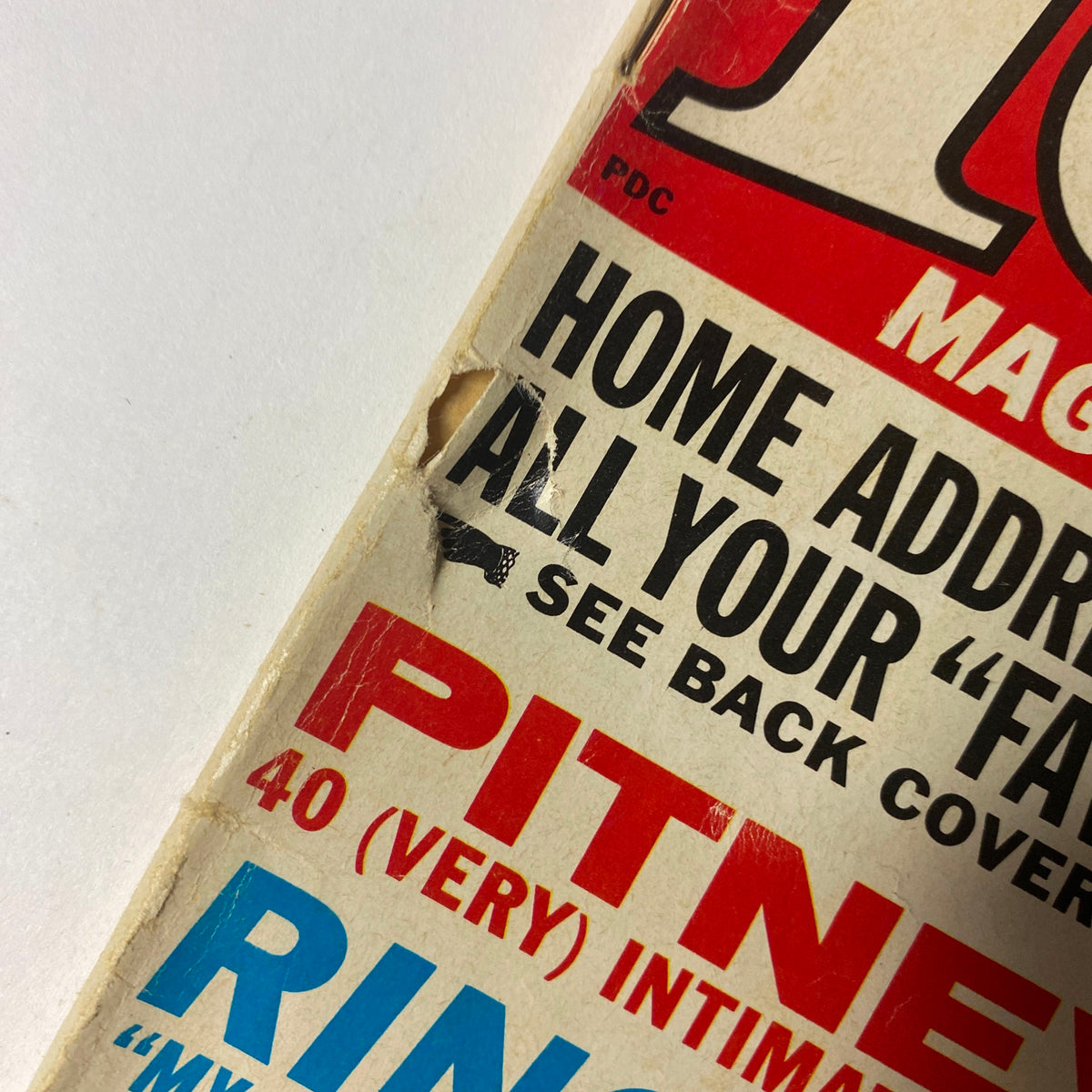 Close-up image of a defect on the cover of 16 Magazine April 1965 featuring a small hole, showing the condition details of the magazine featuring Peter & Gordon and Luke Halpin.