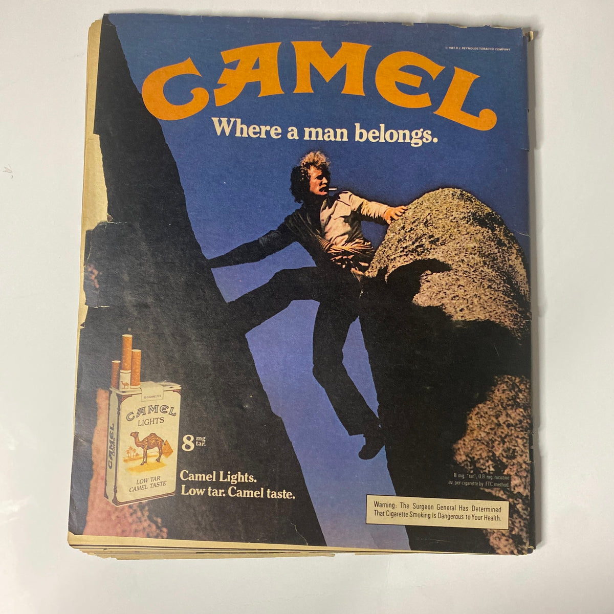 Camel cigarettes advertisement from Rolling Stone Magazine October 1, 1981 - features a man rock climbing with bold text stating 'Where a man belongs.' The ad highlights the magazine's cultural context during the early 1980s.