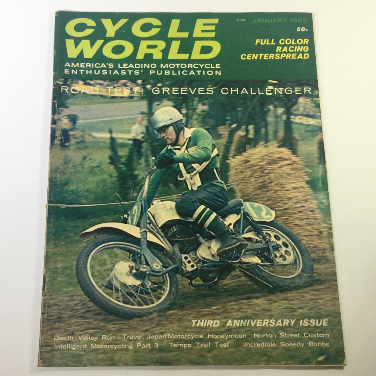 Cover of VTG Cycle World Magazine January 1965 featuring a motorcycle rider in action, showcasing the exciting articles on Death Valley Run and travel insights from Japan.