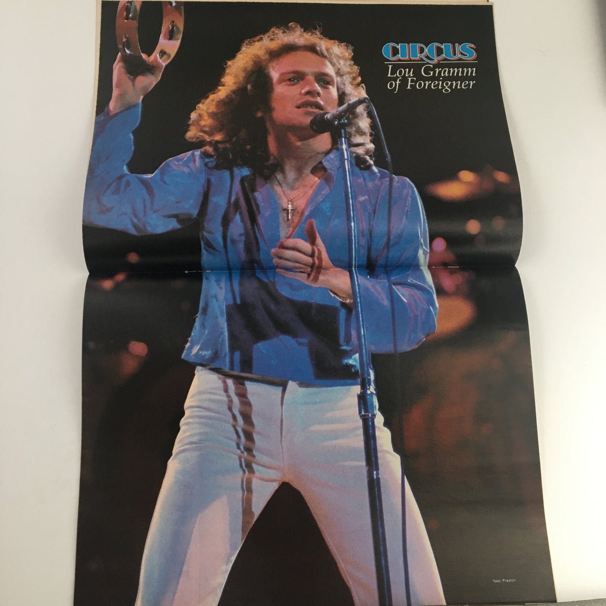 Poster of Lou Gramm from Foreigner featured in Circus Magazine October 24 1978, showcasing his iconic performance style.