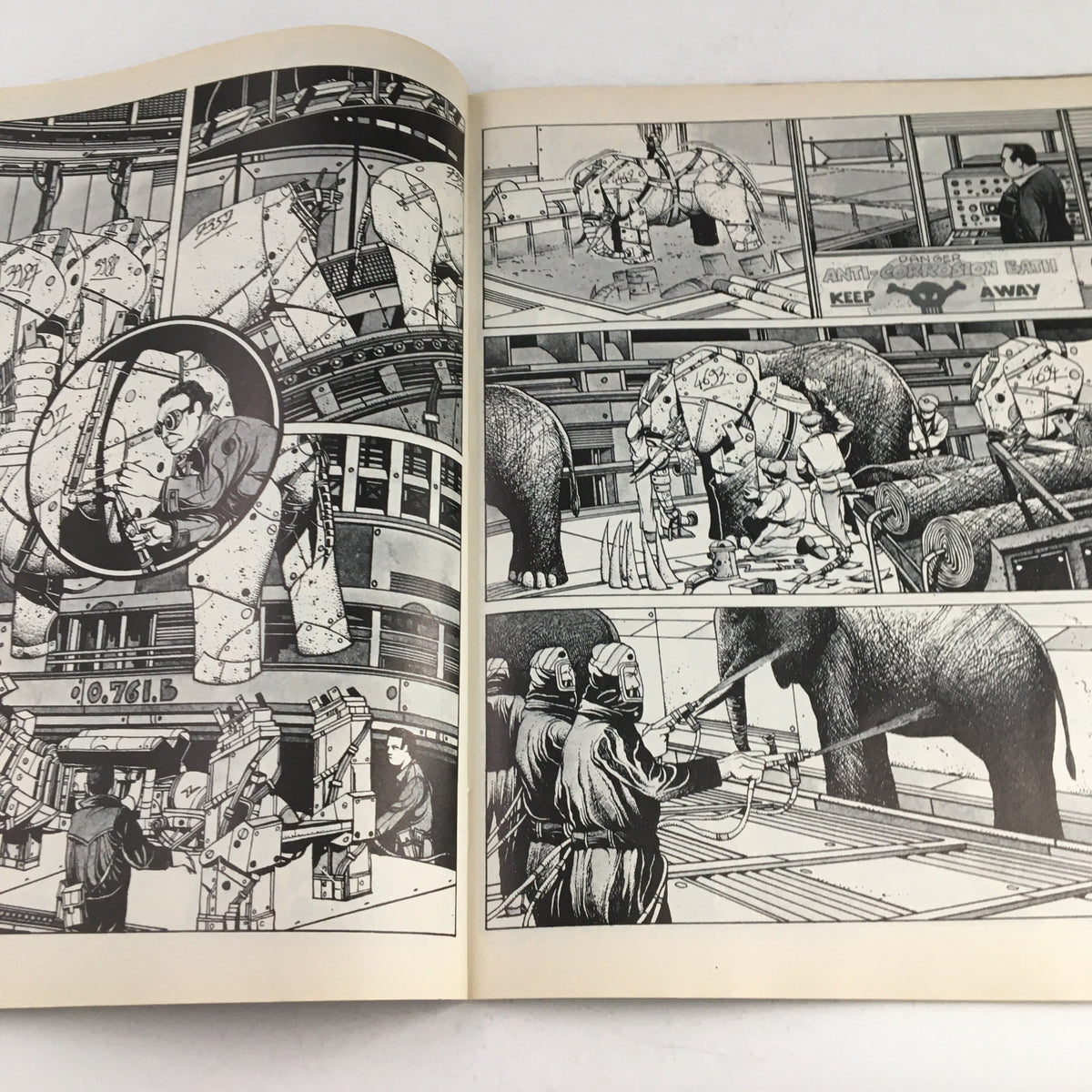 Detailed black and white illustrations in Heavy Metal Magazine January 1979 showing robotic elephants and workers interacting in a mechanical environment.