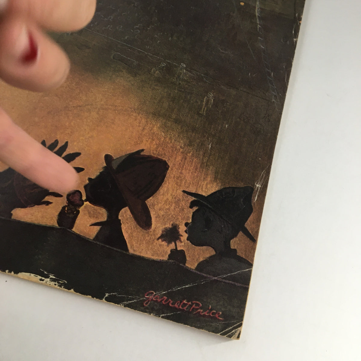 Detailed view of The New Yorker Magazine April 5 1952 cover highlighting the silhouettes and signature of artist Garrett Price.