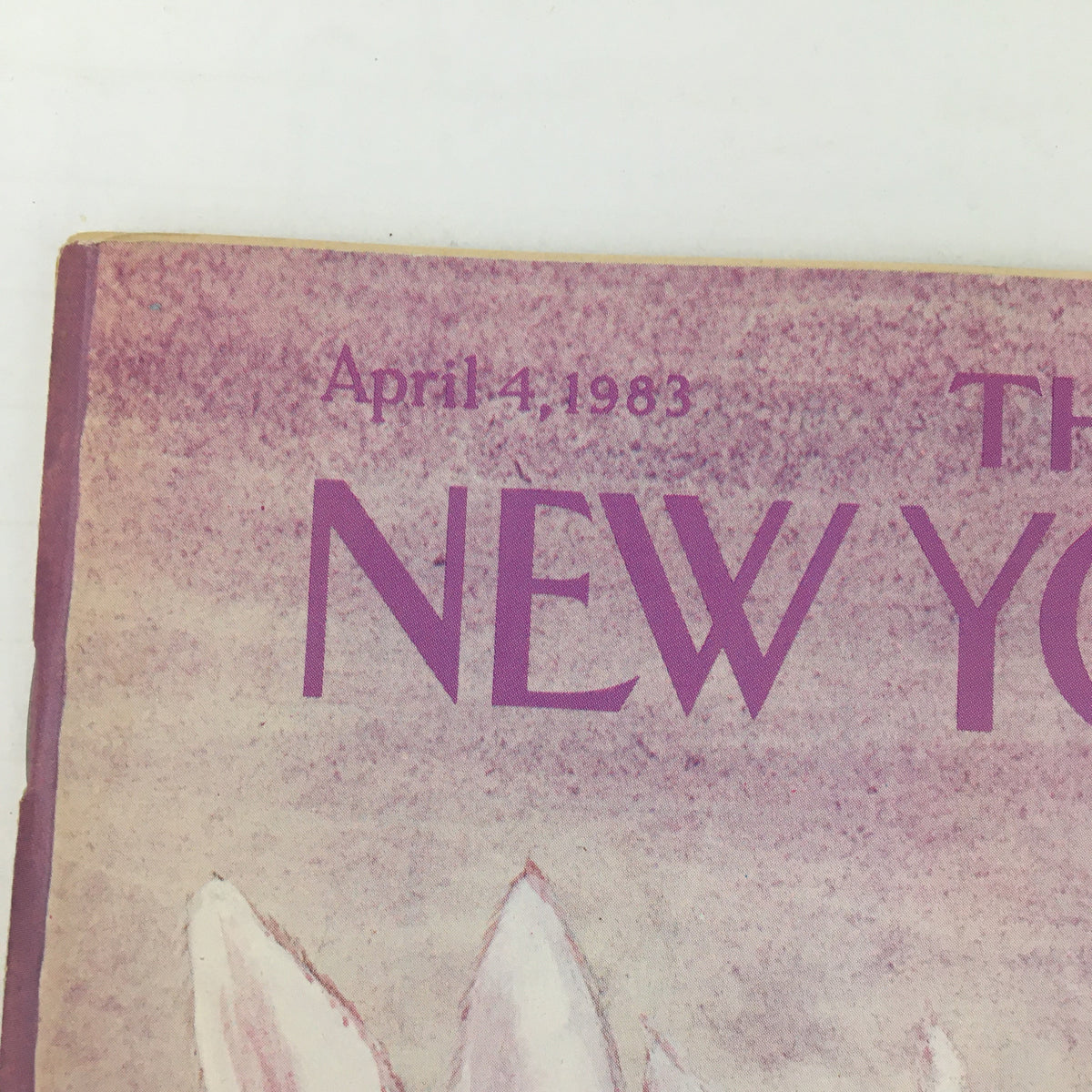 Close-up detail of the title on the cover of The New Yorker Magazine April 4, 1983, highlighting 'The New Yorker' with a pastel background.
