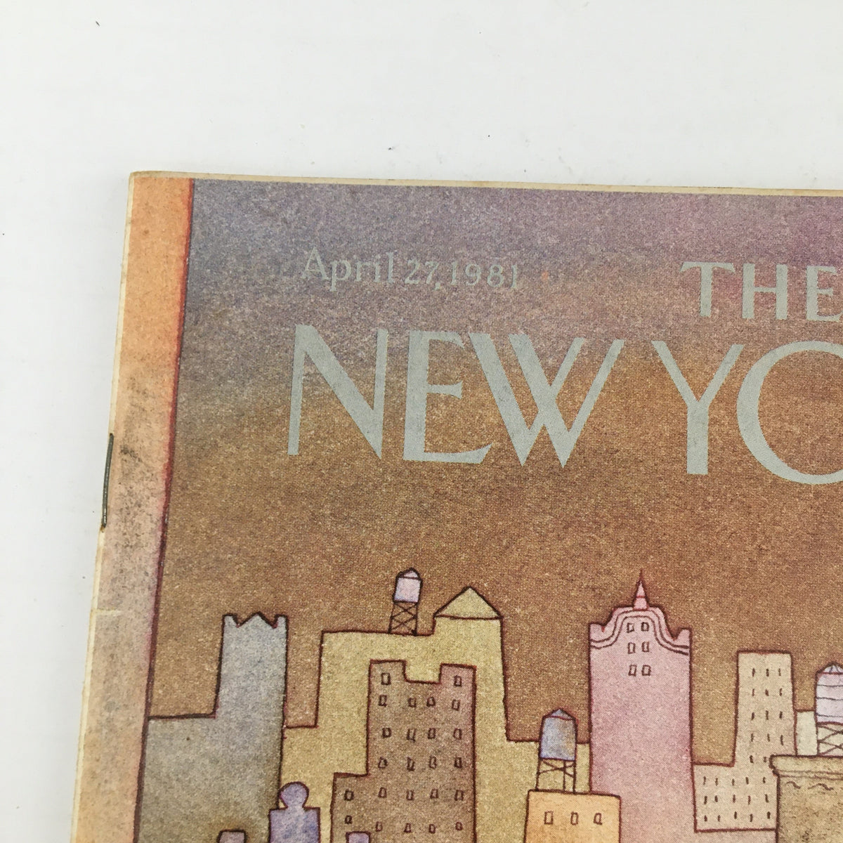 Close-up view of The New Yorker Magazine April 27 1981 cover, highlighting the city landscape and title design by Lonni Sue Johnson in soft hues.