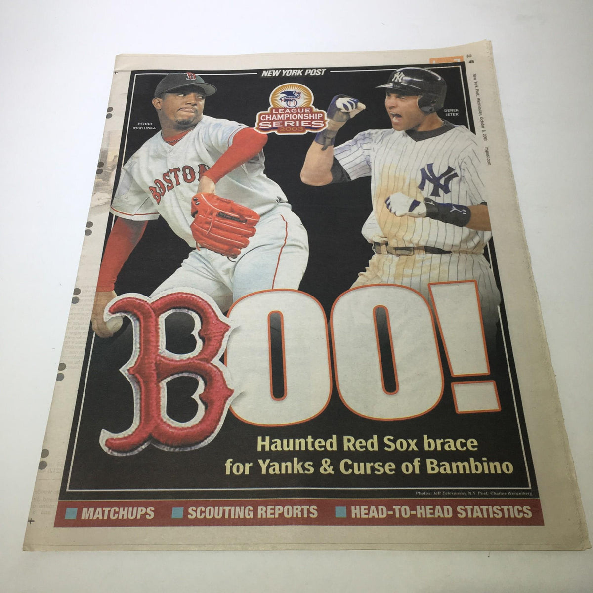 New York Post cover featuring the headline 'BOO!' highlighting the Haunted Red Sox ready against the Yankees and the Curse of Bambino, showcasing images of Red Sox and Yankee players in action.
