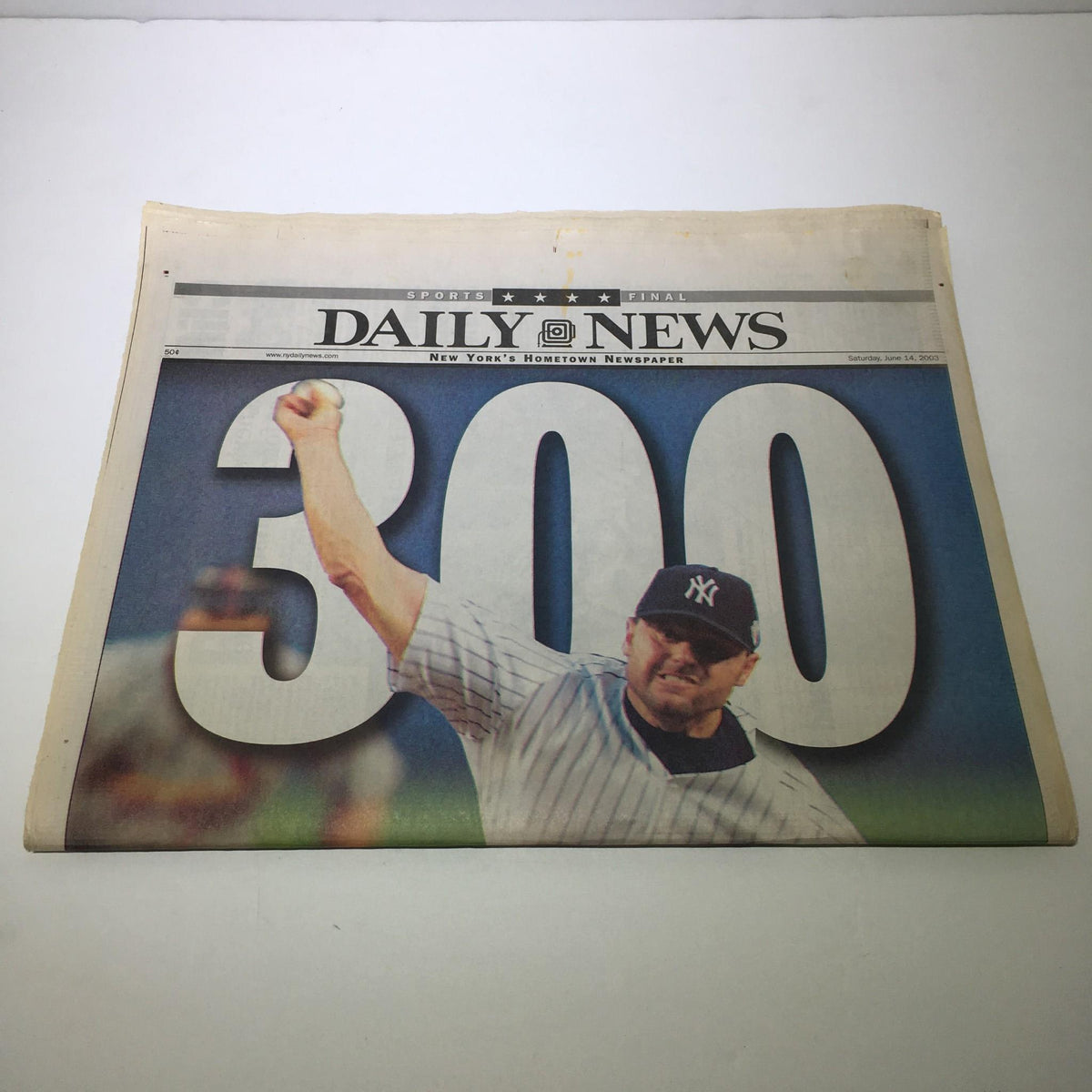 Front page of NY Daily News from June 14, 2003, showcasing the large number '300' celebrating the Rocket as the 21st pitcher to win this many games.