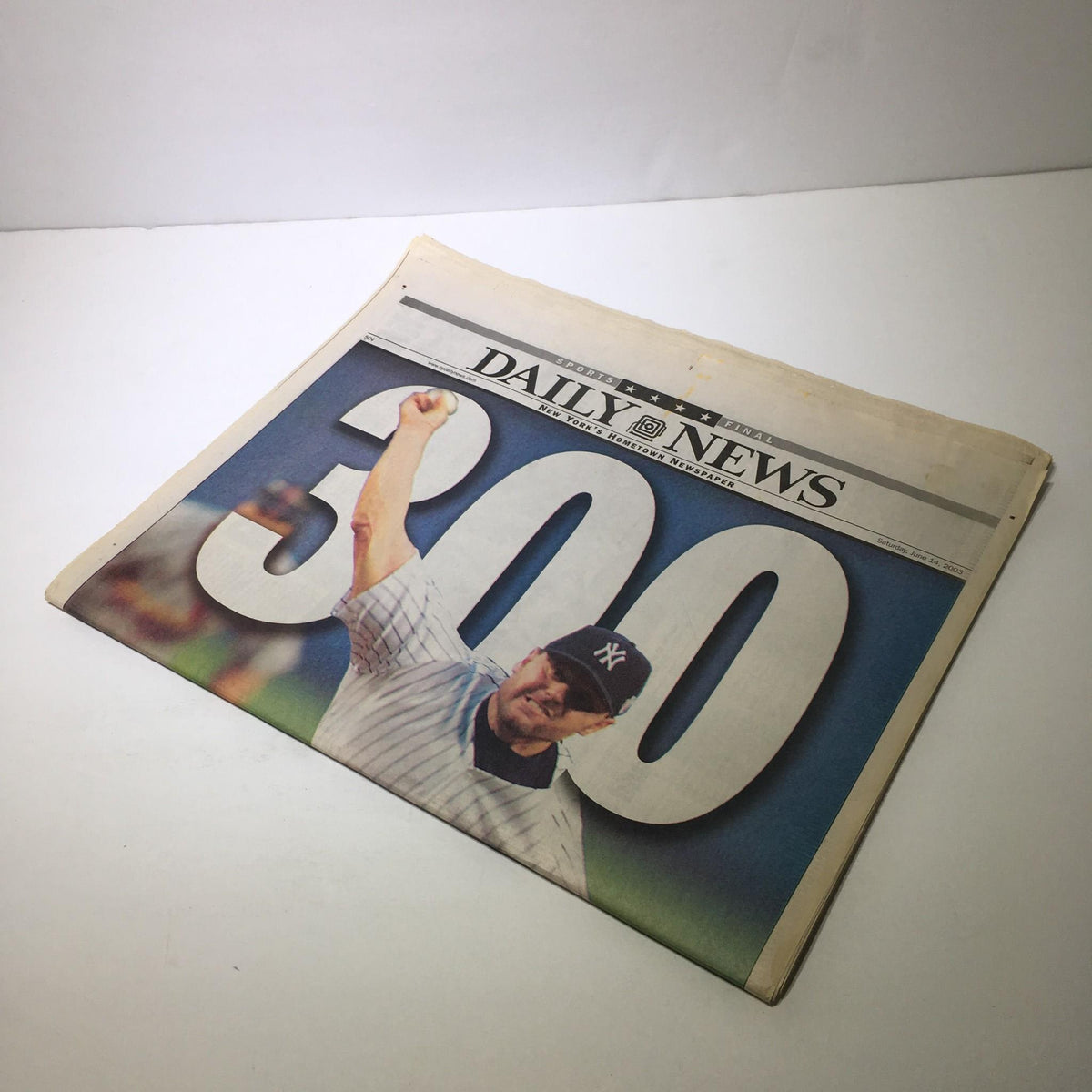Alternate view of NY Daily News front page from June 14, 2003, featuring the large number '300' in celebration of the Rocket's achievement.