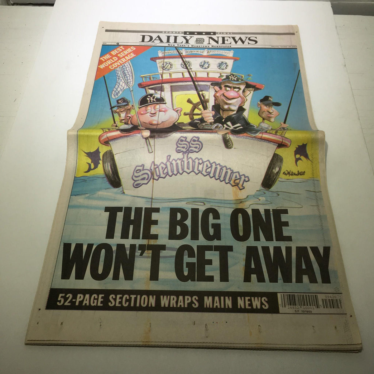 NY Daily News front page from October 18, 2003, featuring a cartoon illustration of three characters on a boat titled 'SS Steinbrenner' with the headline 'THE BIG ONE WON'T GET AWAY'.
