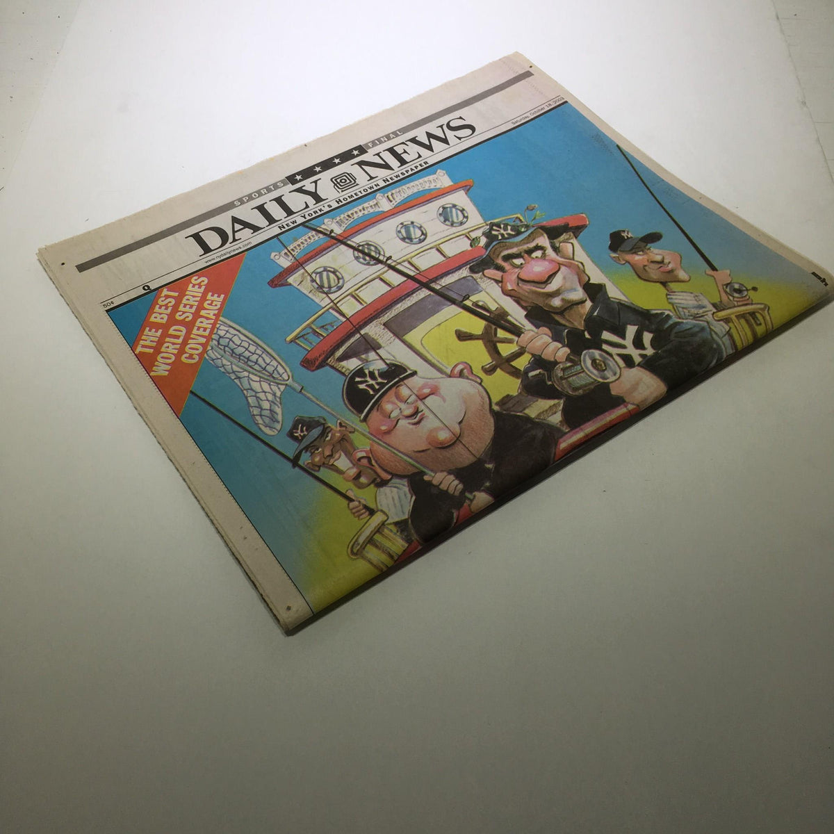 Image of the NY Daily News from October 18, 2003, featuring a cartoon illustration related to Steinbrenner and the World Series, highlighting the theme 'The Big One Won't Get Away'.
