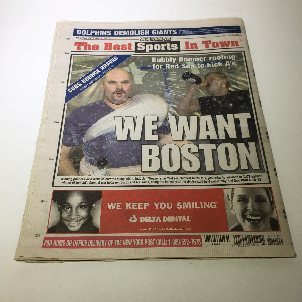 New York Post front page highlighting the headline "WE WANT BOSTON" with an image of a fan in celebration, emphasizing the rivalry between sports teams.