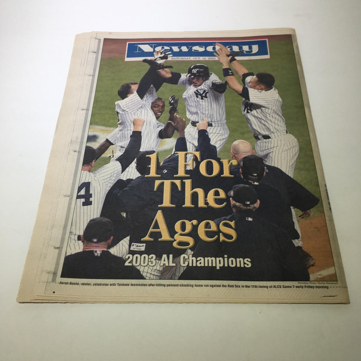 Front page of Newsday, dated October 18, 2003, featuring the headline '1 For The Ages' and celebrating the 2003 AL Champions, with players rejoicing in celebration.