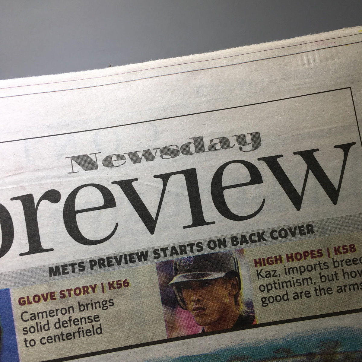 Newsday preview section showcasing headlines, featuring the title "Newsday: April 4 2004 The Great Race Yankees, Red Sox Set For Classic Run". The preview sections are highlighted above, emphasizing upcoming sports articles.