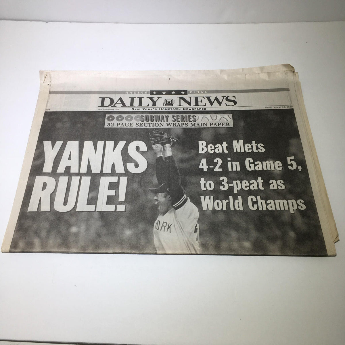 Front page of the NY Daily News with the title 'NY Daily News: 10/27/2000 Yanks Beat Mets 4-2 In Game 5 2 3-Peat As World Champs', prominently displaying 'Yanks Rule!'.