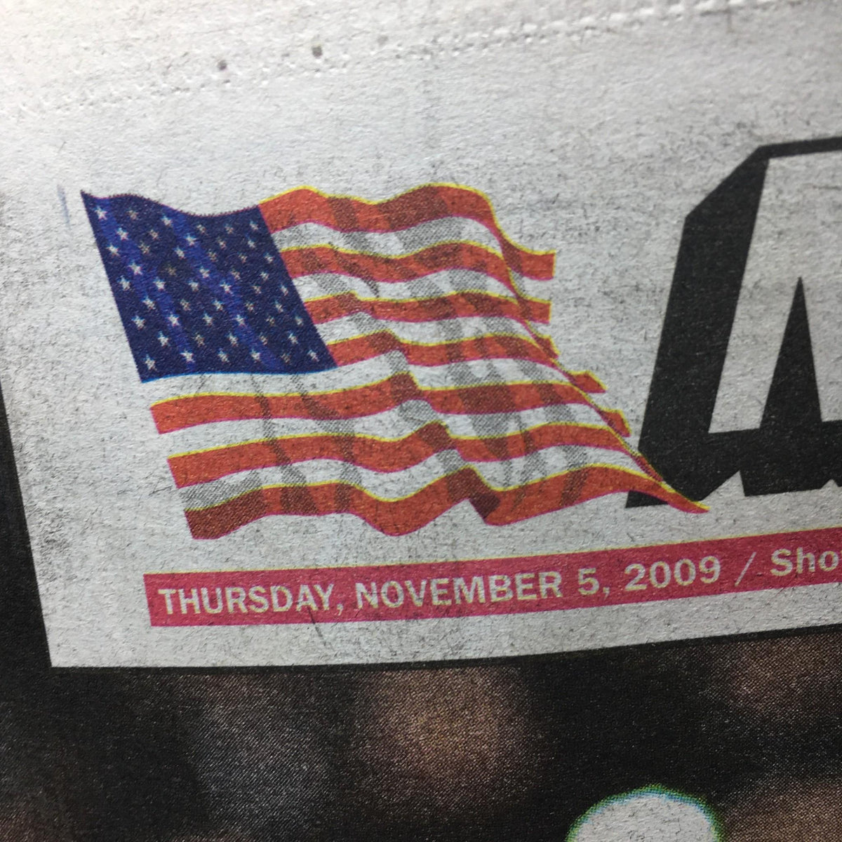 Close-up of the New York Post logo and American flag, dated Thursday, November 5, 2009, celebrating Yankees' World Series win.