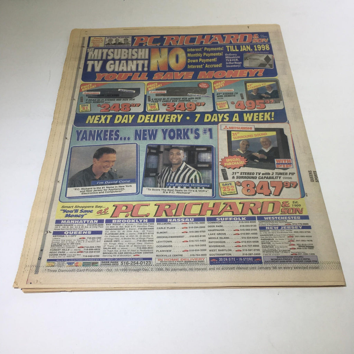 Advertisement section of Newsday with a promotion for P.C. Richard featuring Yankees-related content, dated October 27, 1996, alongside a celebration of the Yankees' championship win.