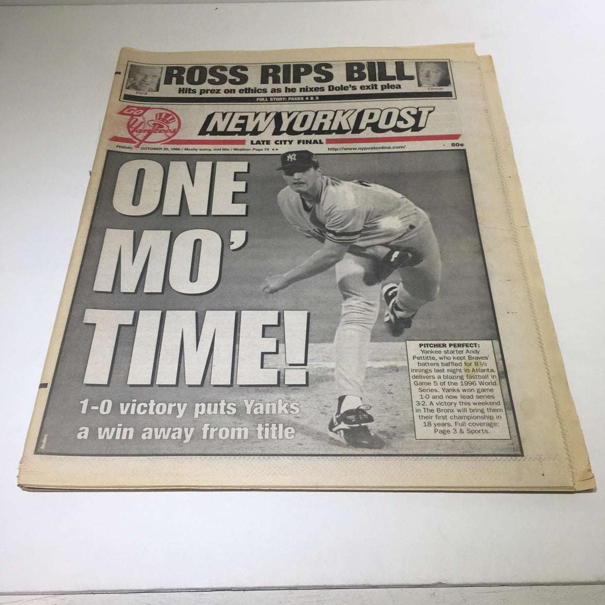 New York Post: Oct 25 1996 One Mo' Time newspaper featuring a headline about a Yankees game, showcasing a player in action and celebrating their victory.