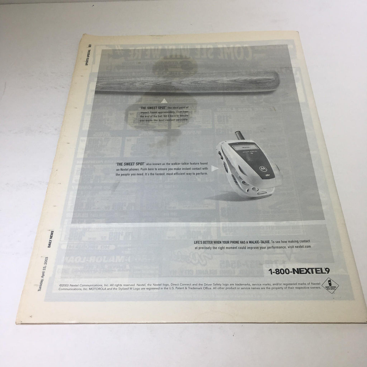 Back cover of the New York Daily News: April 15 2003 Blue Panel Ranks A Century Of Highlights showcasing an advertisement and a baseball bat.