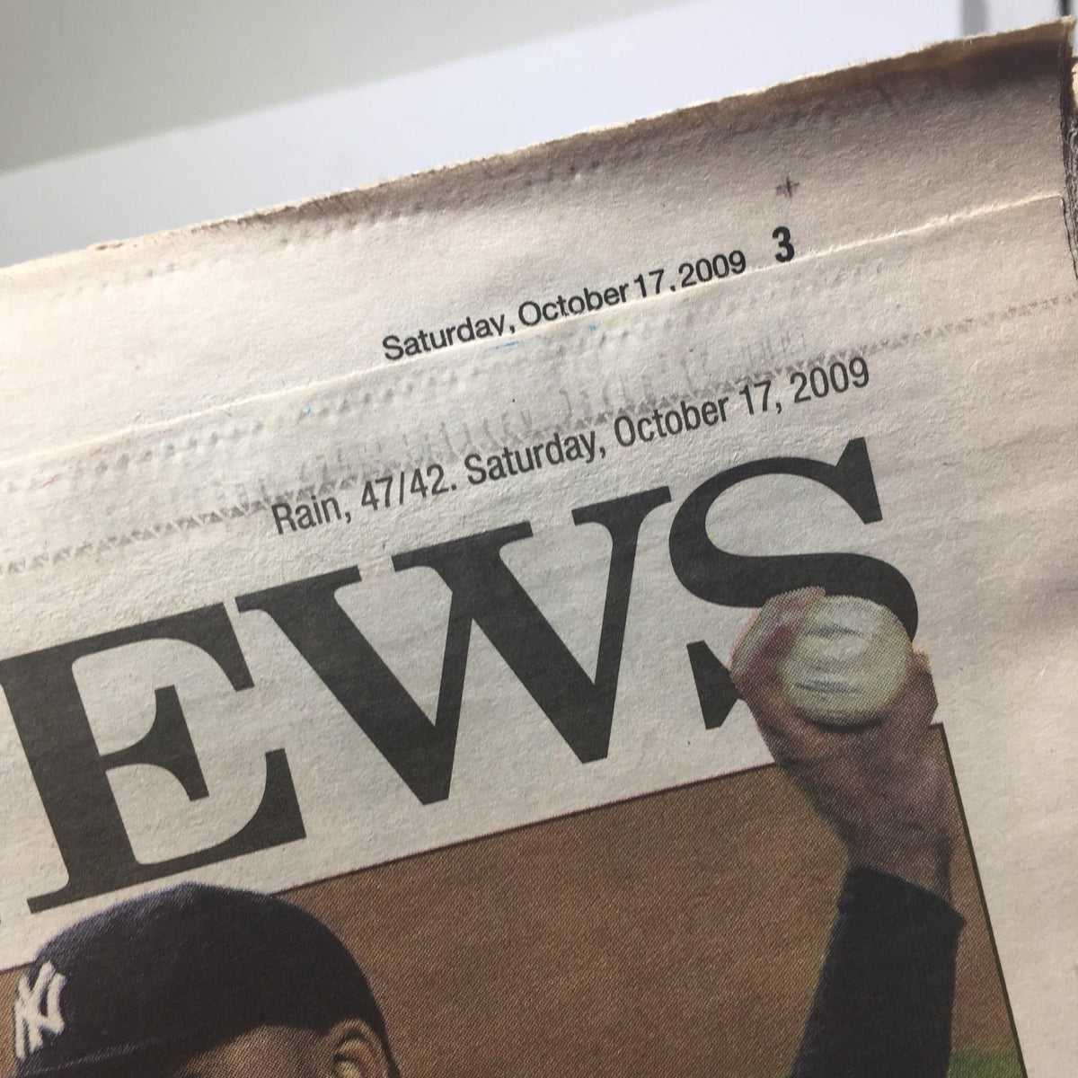 Date header from NY Daily News, October 17, 2009, displaying weather conditions 'Rain, 47/42' and confirming the publication date.