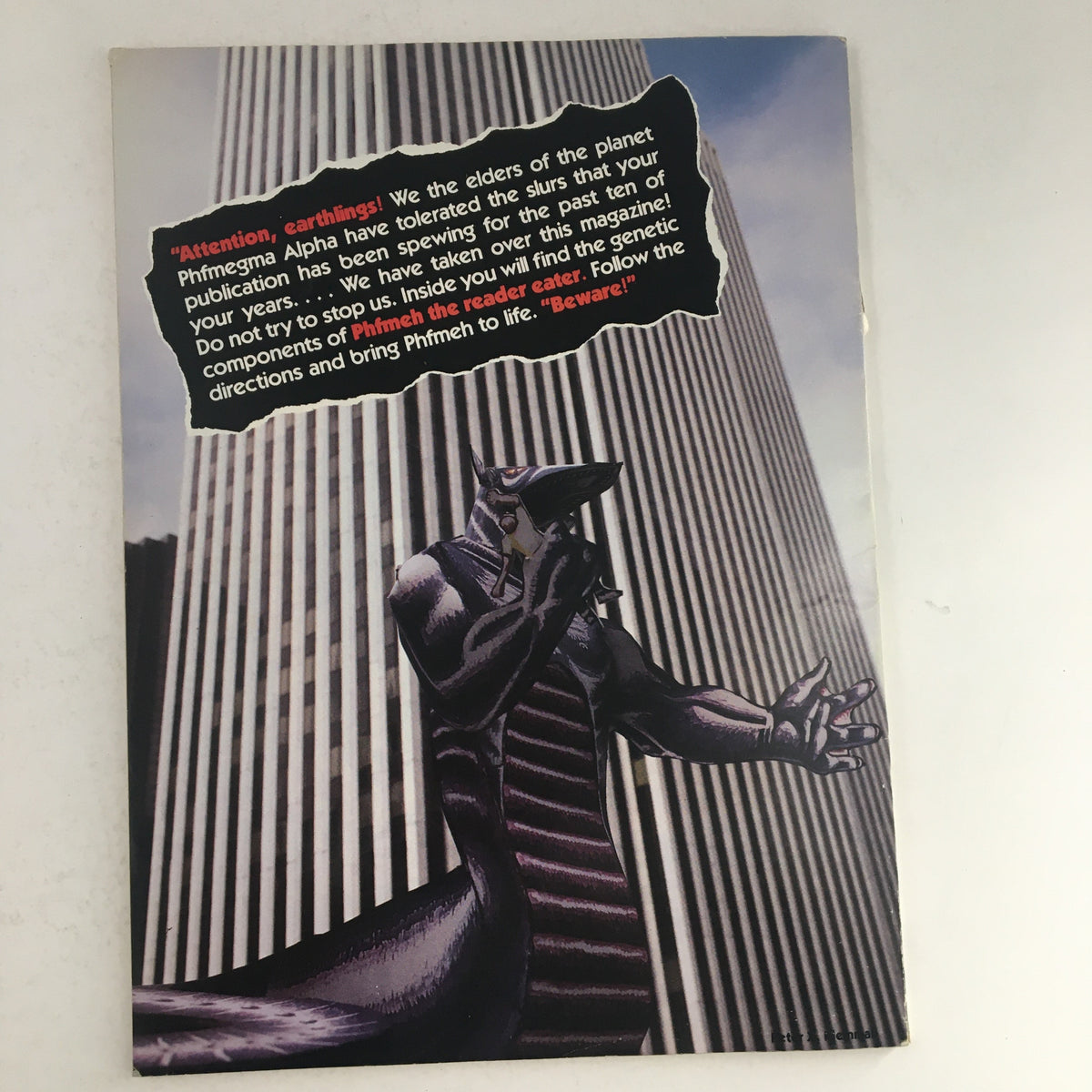 Back cover of Heavy Metal Fantasy Magazine Summer 1987 featuring a dramatic monster depiction and a warning message addressing the readers.