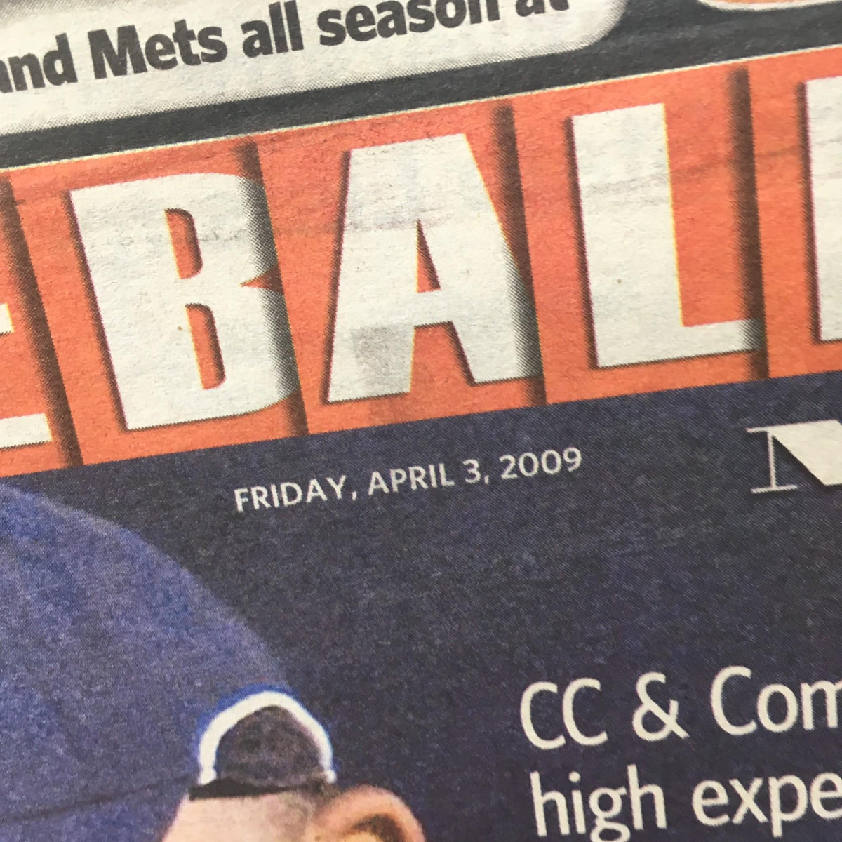 Close-up of the Newsday newspaper date section dated Friday, April 3, 2009, highlighting the day's sports news.