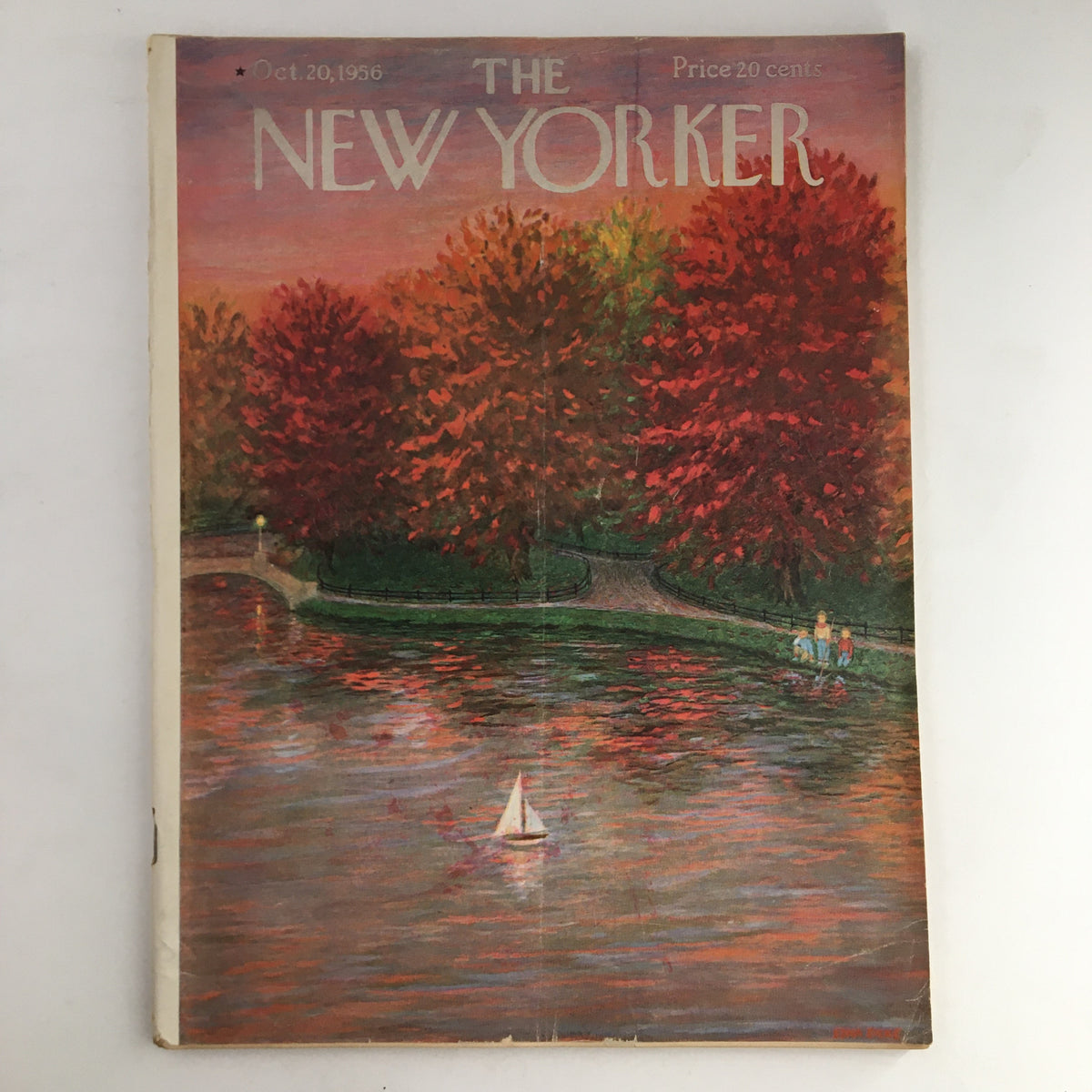 Cover of The New Yorker Magazine October 20 1956 featuring vibrant autumn scenery with red trees and a small sailboat on the water, created by artist Edna Eicke.