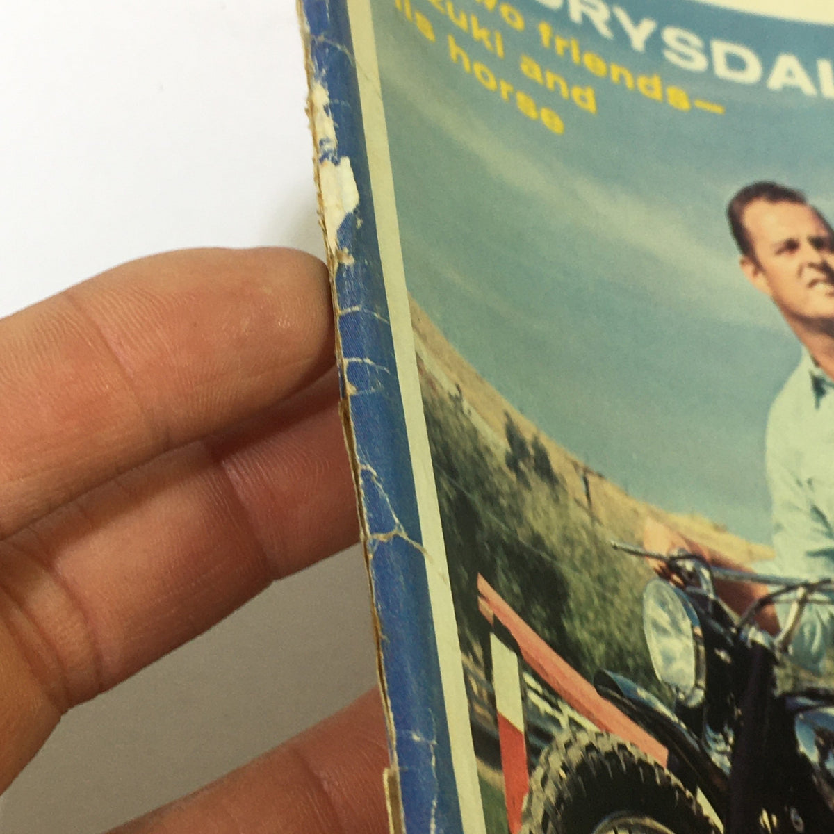 Close-up view of the spine of VTG Cycle Magazine March 1966, highlighting the wear and vintage character of the publication.