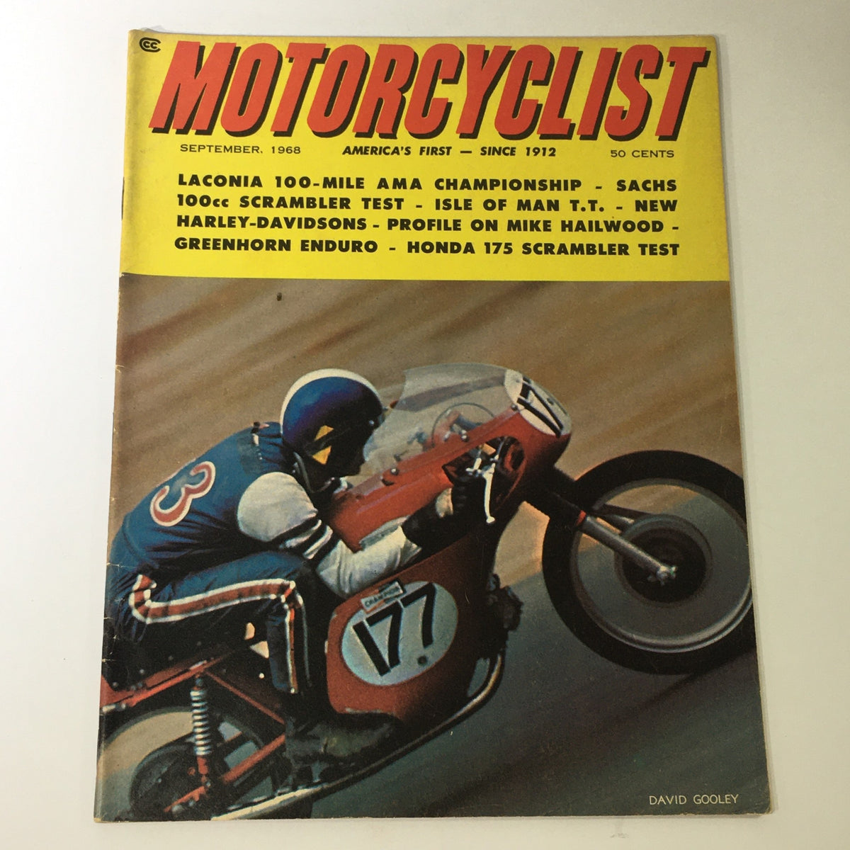 Cover of VTG Motorcyclist Magazine from September 1968 featuring a motorcycle racer with the number 77, showcasing a Sachs 100cc Scrambler Test and highlights on motorcycle events.
